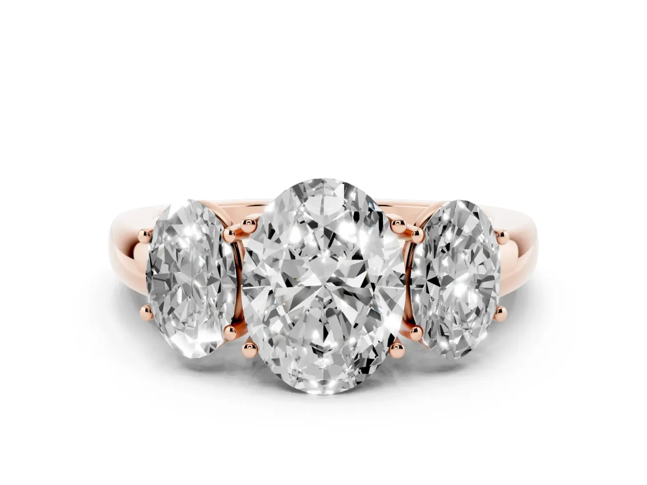 Oval Cut Diamond Three-Stone Ring Set in Rose gold with Bold Center and Classic Band