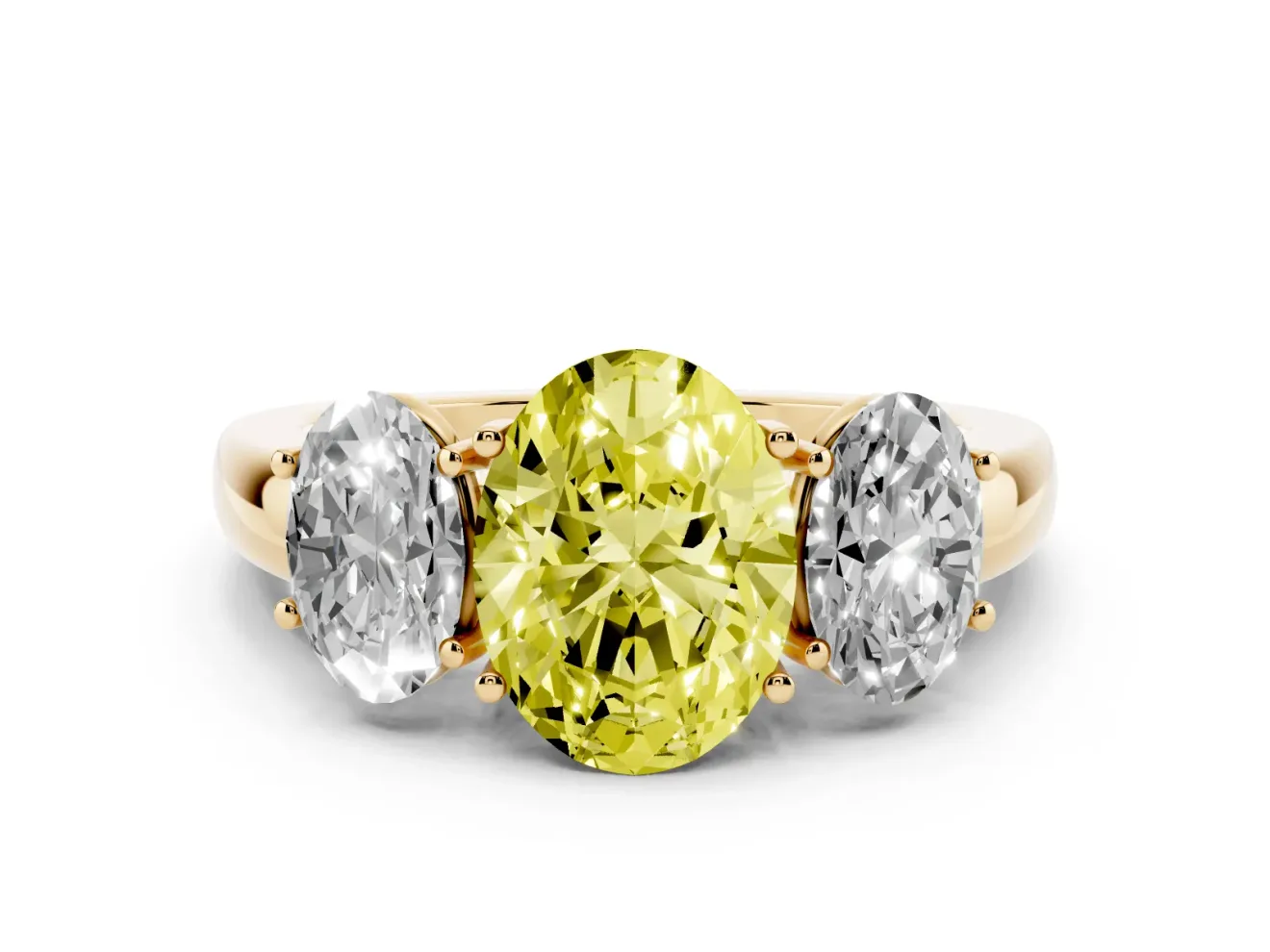 Fancy Yellow Oval Cut Diamond Three-Stone Ring Set in Yellow gold with Bold Center and Classic Band