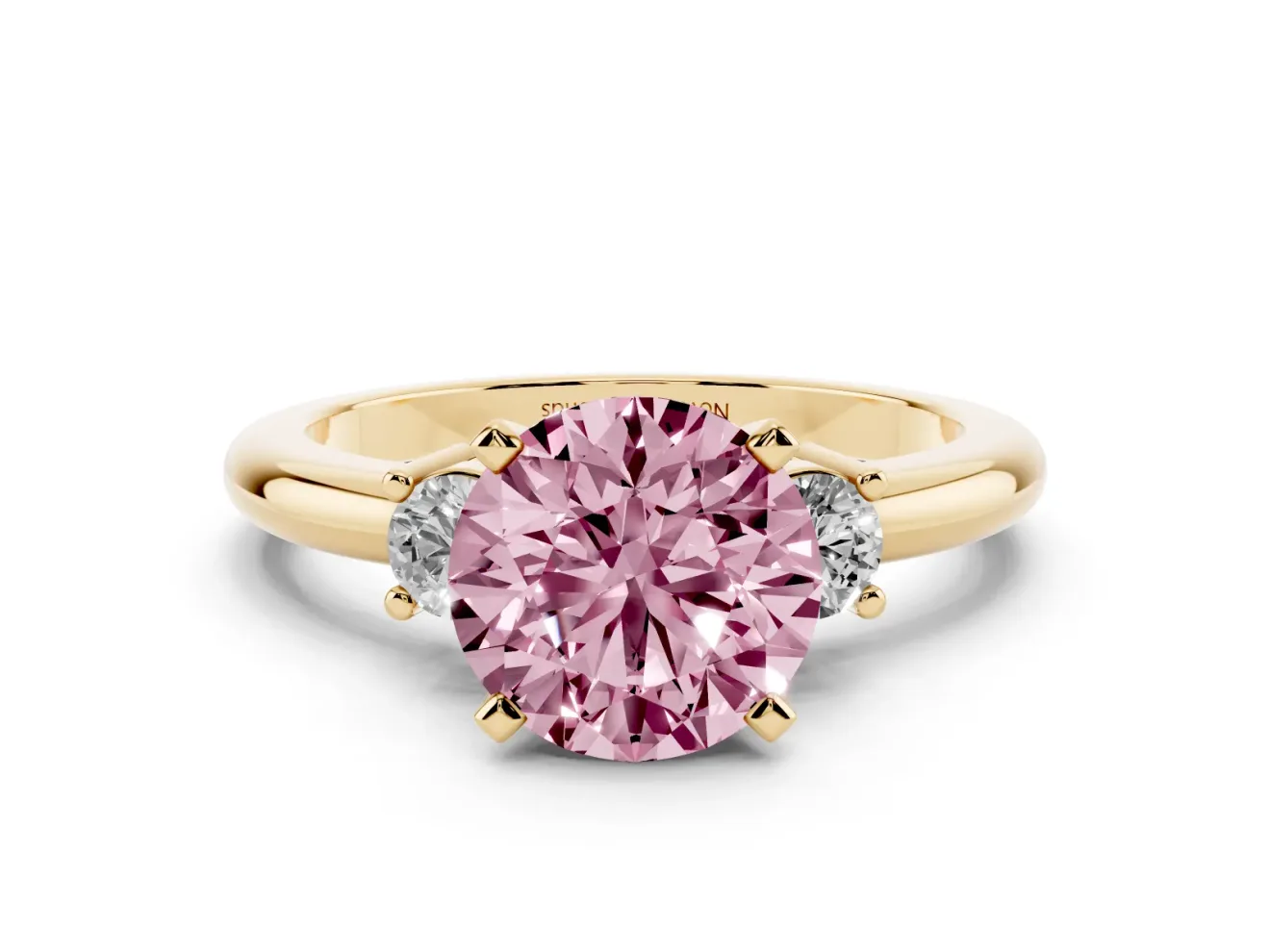 Fancy Pink Three-Stone Round Cut Diamond Ring Set in Yellow gold with Prong Setting and Plain Band