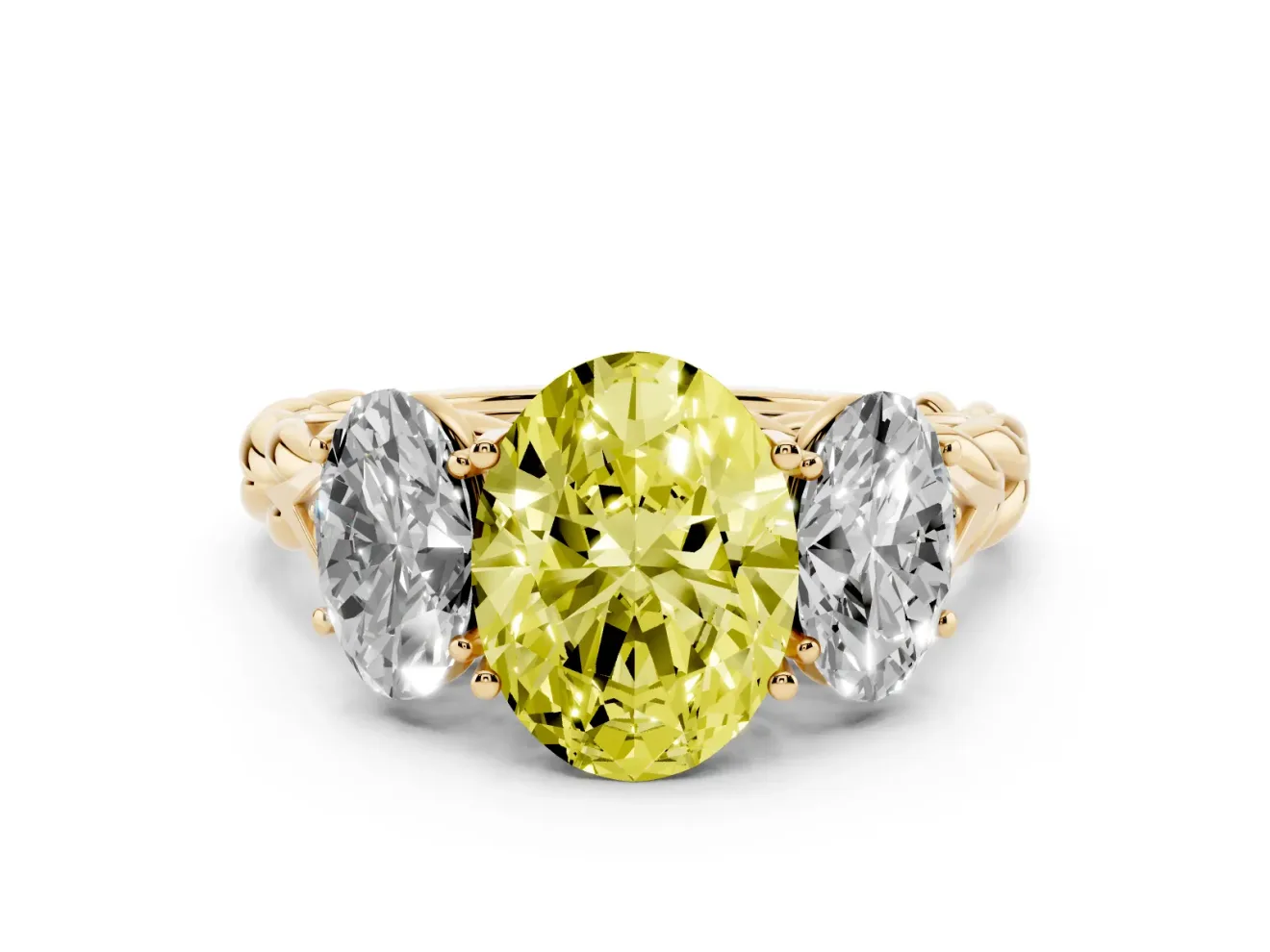 Fancy Yellow Oval Cut Diamond Three-Stone Ring Set in Yellow gold with Braided Band