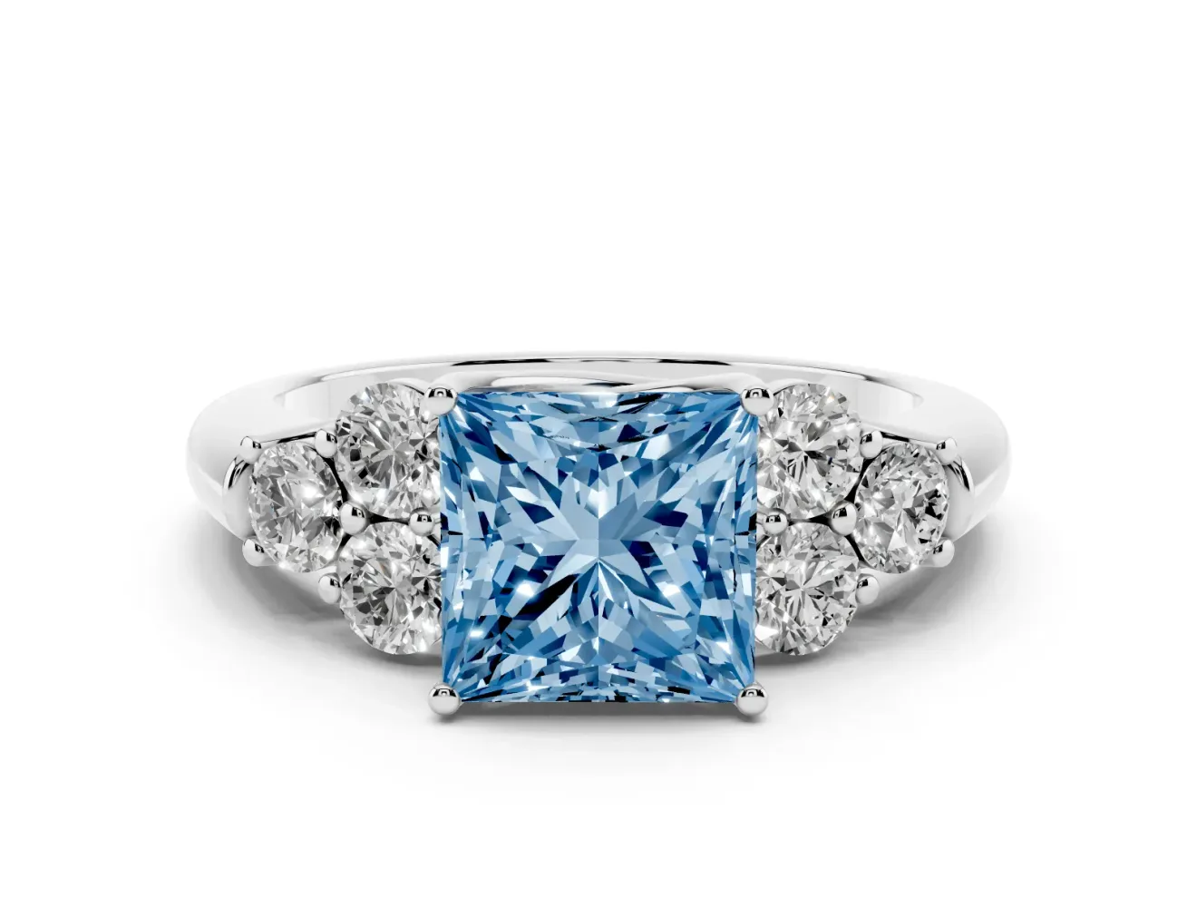 Fancy Blue Princess Cut Diamond Cluster Ring Set in Silver with Round Accent Stones and Prong Setting on a Plain Band