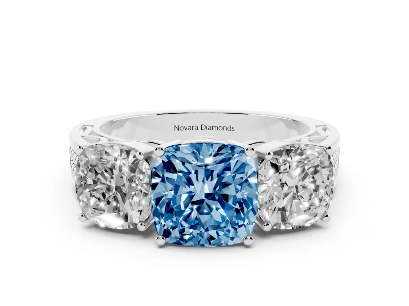 Fancy Blue Cushion Cut Diamond Three-Stone Ring Set in Platinum with Textured Band