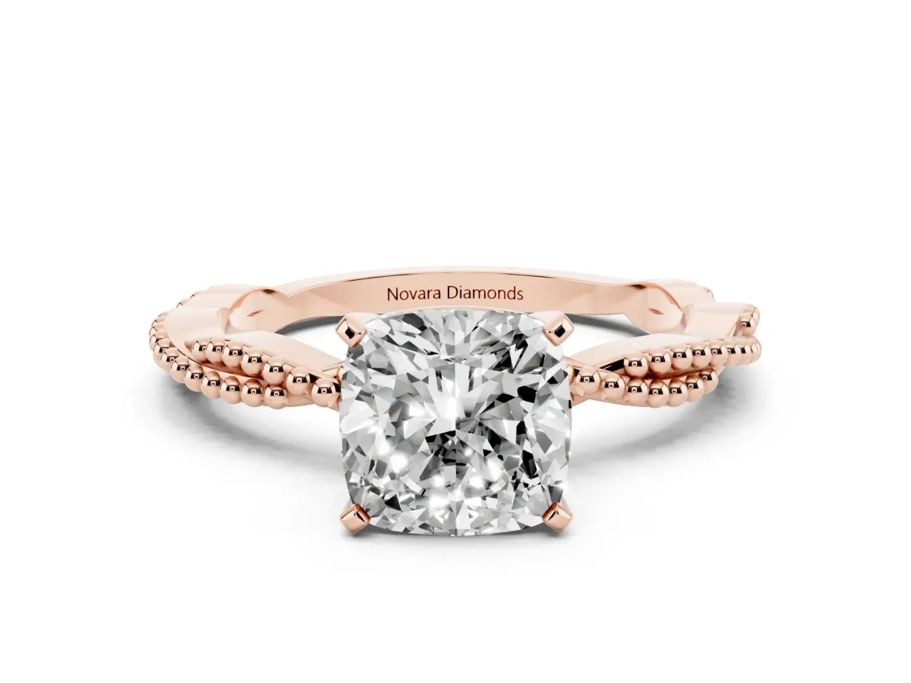 Cushion Cut Diamond Solitaire Ring Set in Rose gold with Twisted Band and Bead Prong Setting
