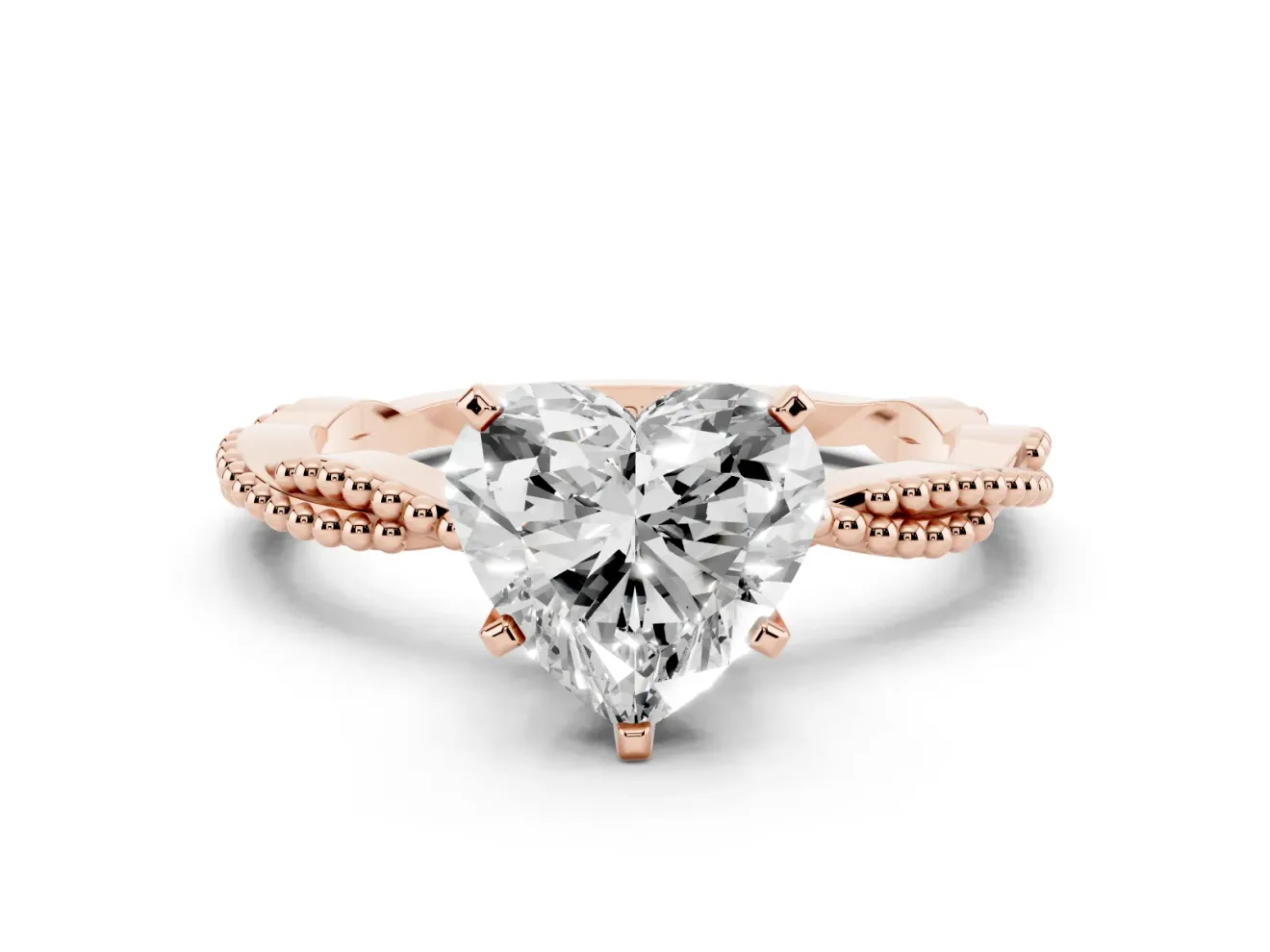 Heart Cut Diamond Solitaire Ring Set in Rose gold with Twisted Band and Bead Prong Setting