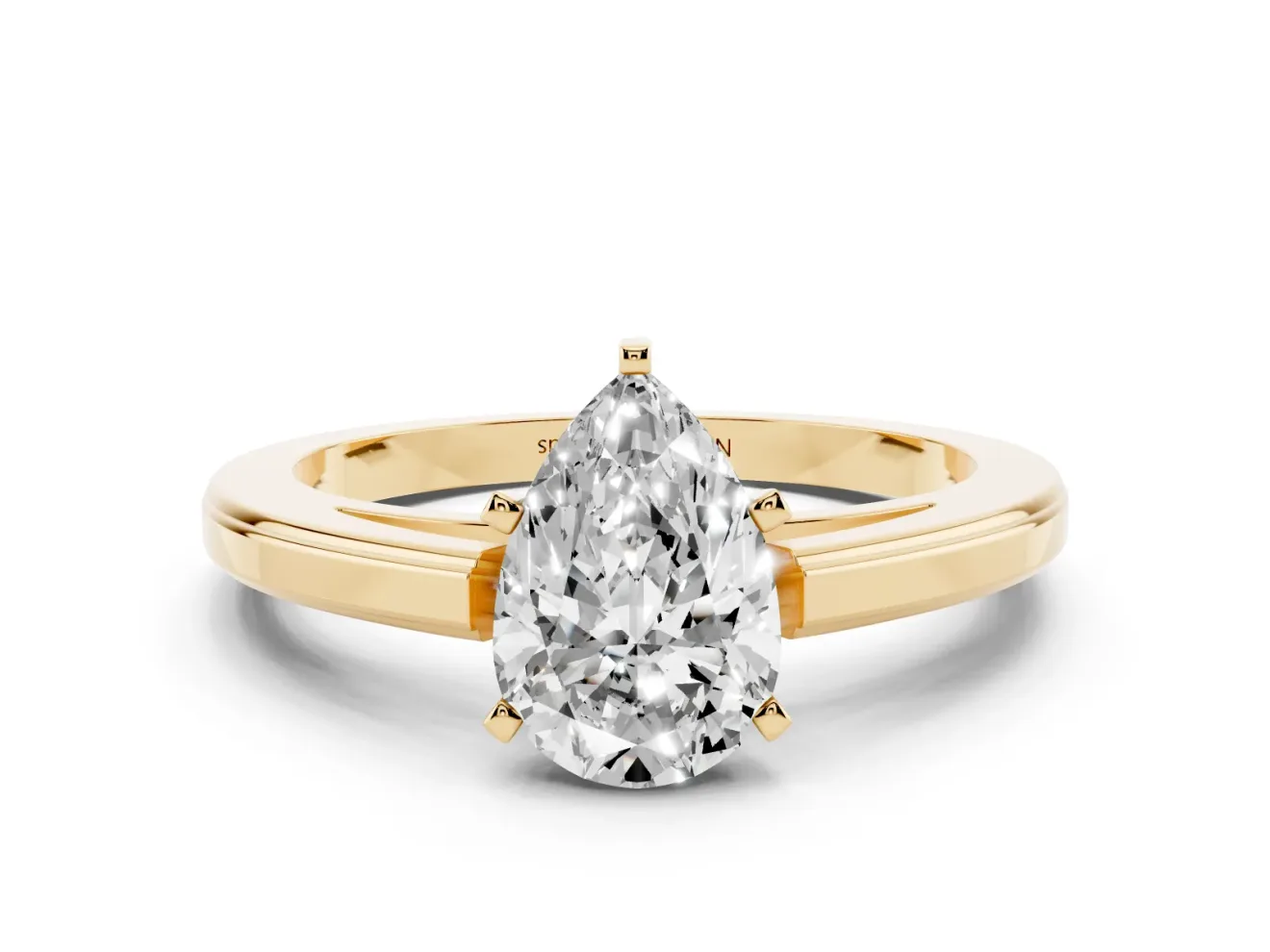 Pear Cut Diamond Solitaire Ring Set in Yellow gold with Prong Setting and Classic Band