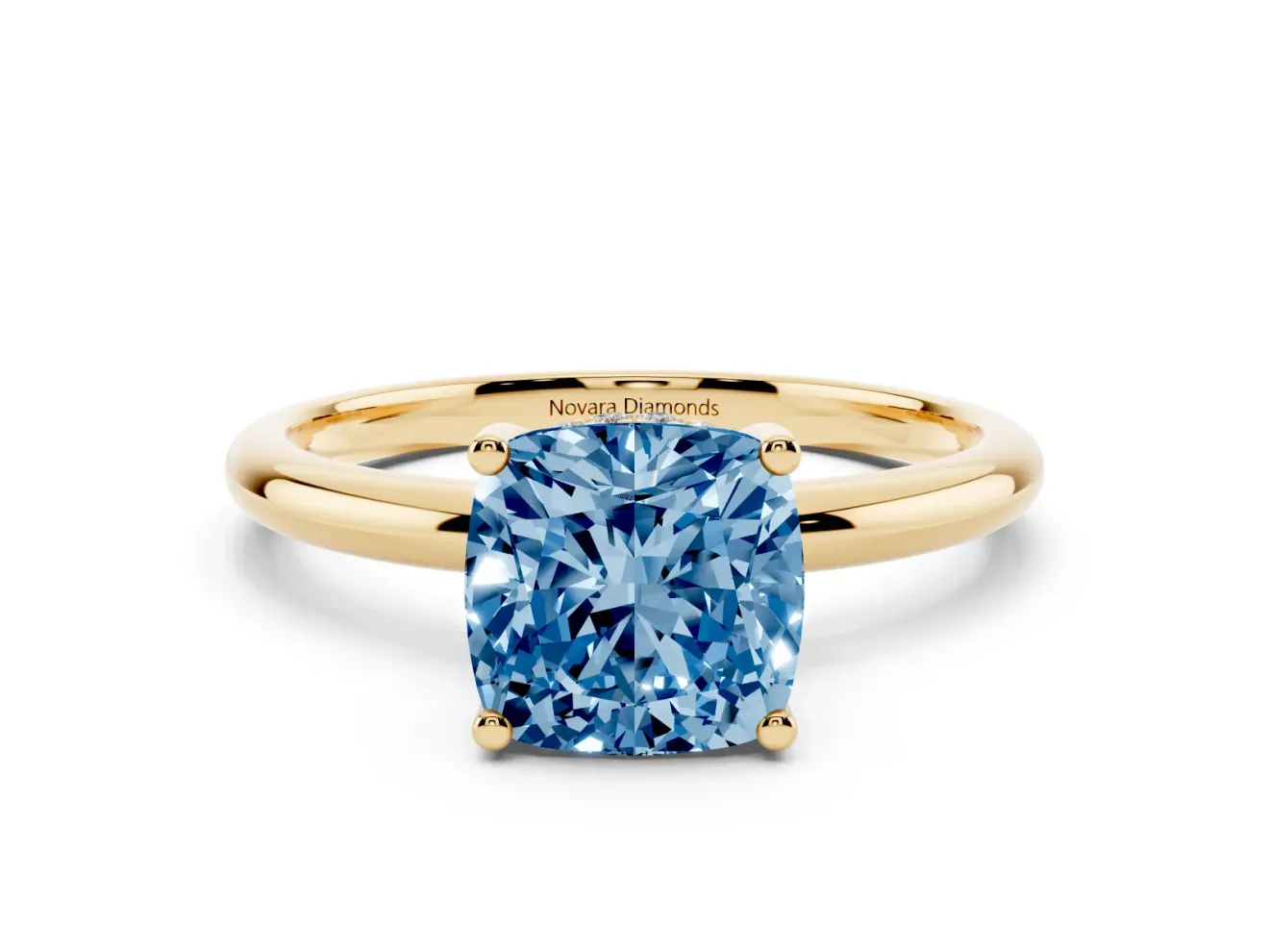 Fancy Blue Cushion Cut Diamond Solitaire Engagement Ring Set in Yellow gold with Prong Setting and Polished Band