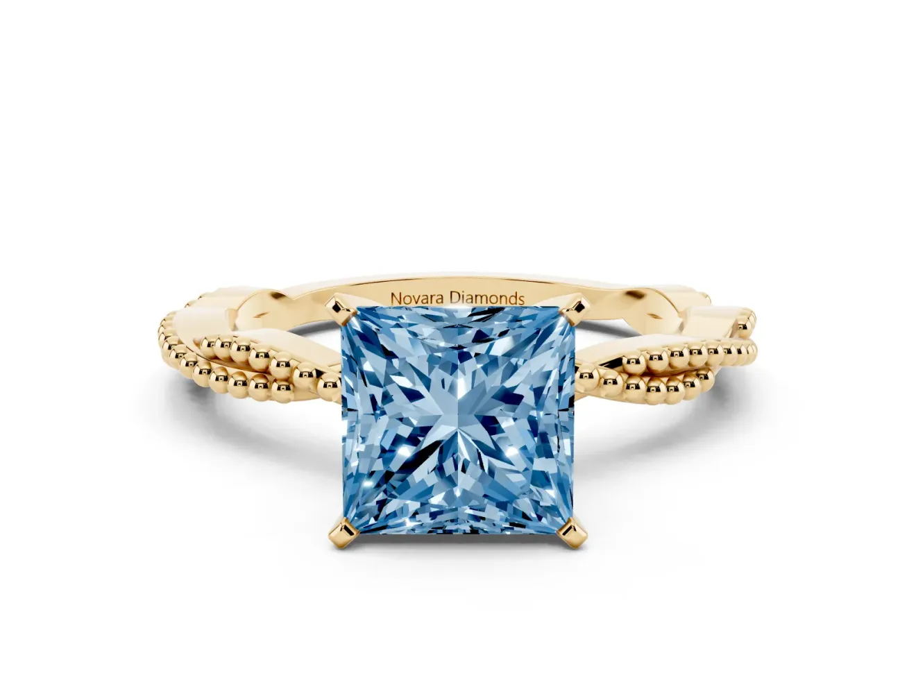 Fancy Blue Princess Cut Diamond Solitaire Ring Set in Yellow gold with Twisted Band and Bead Prong Setting