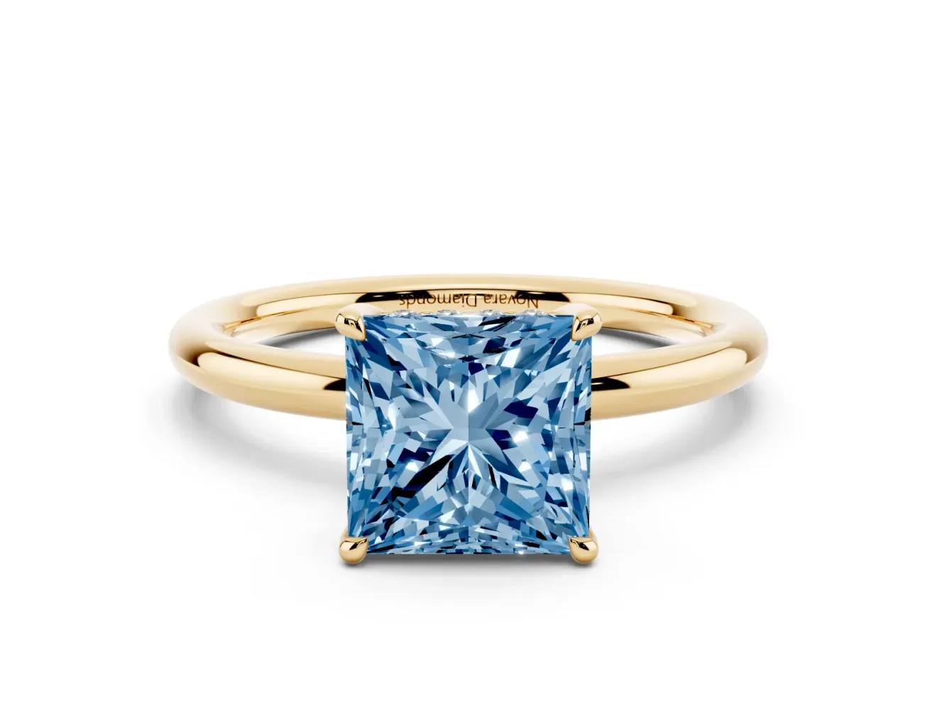 Fancy Blue Princess Cut Diamond Solitaire Ring Set in Yellow gold with Thin Band and Prong Setting