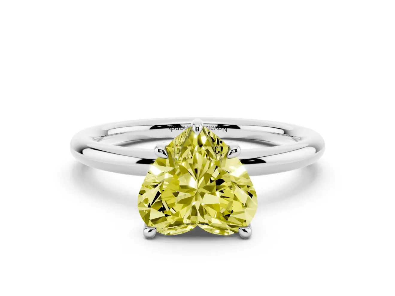 Fancy Yellow Heart Cut Diamond Solitaire Ring Set in Silver with Thin Band and Prong Setting