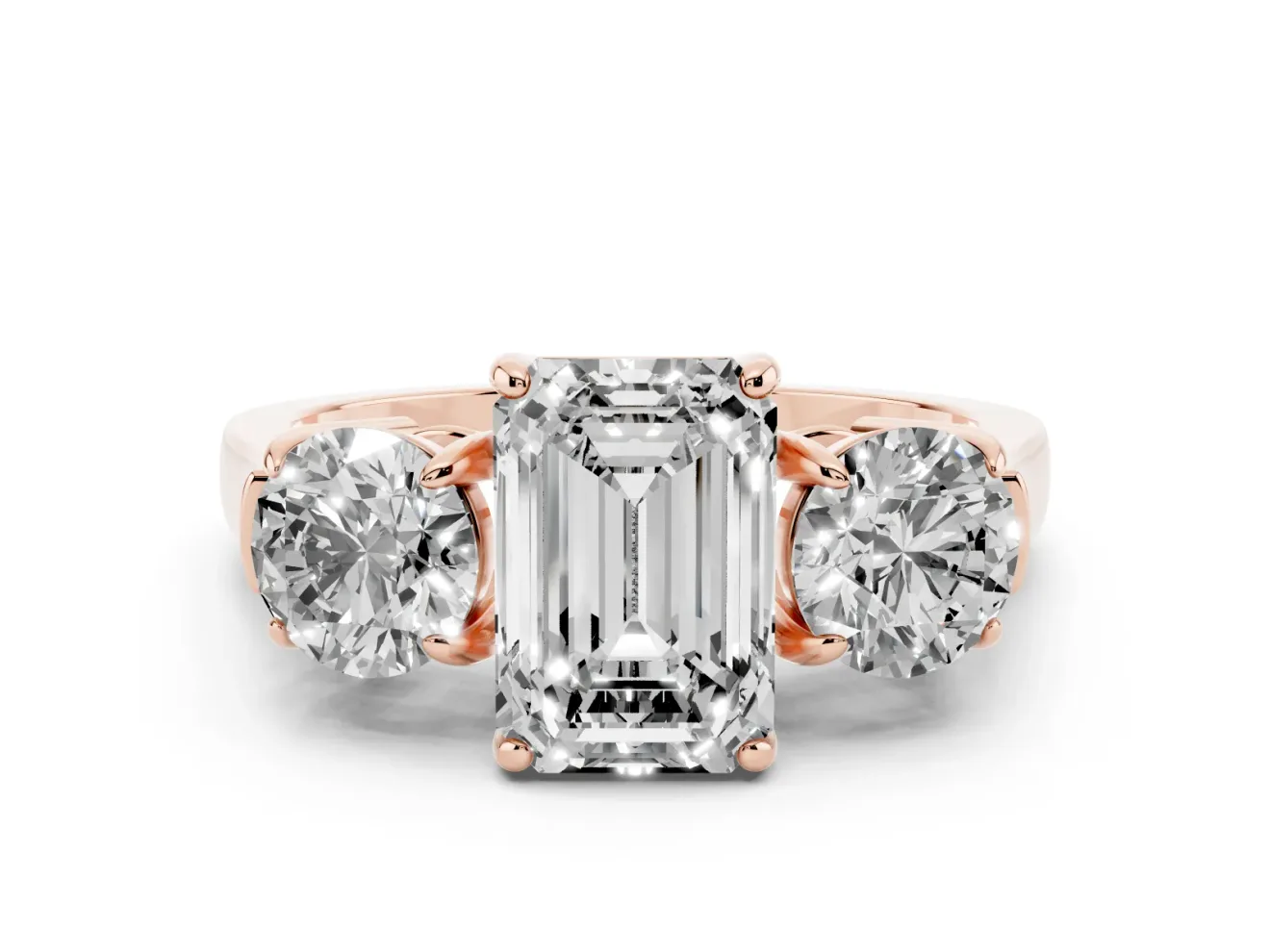 Emerald Cut Three Stone Engagement Ring Setting | Round Side Stones and Open Baskets | Rose Gold