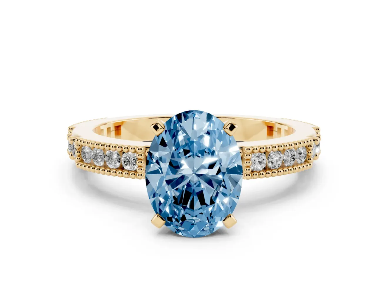 Fancy Blue Oval Cut Diamond Solitaire Ring Set in Yellow gold with Slim Pavé Band and Prong Setting