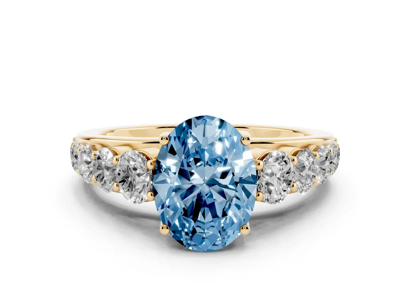 Oval Graduated Side Stone Engagement Ring Setting for a Fancy Blue Lab-Grown Diamond | Flat Top Band | Yellow Gold