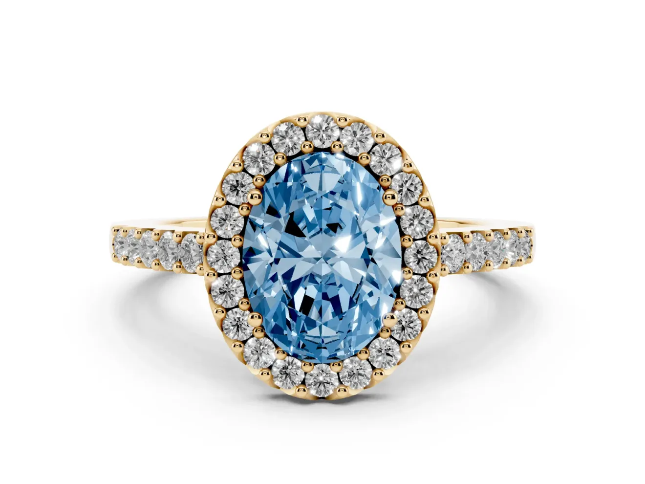 Fancy Blue Oval Cut Diamond Halo Pavé Solitaire Ring Set in Yellow gold with Prong-Set Center Stone