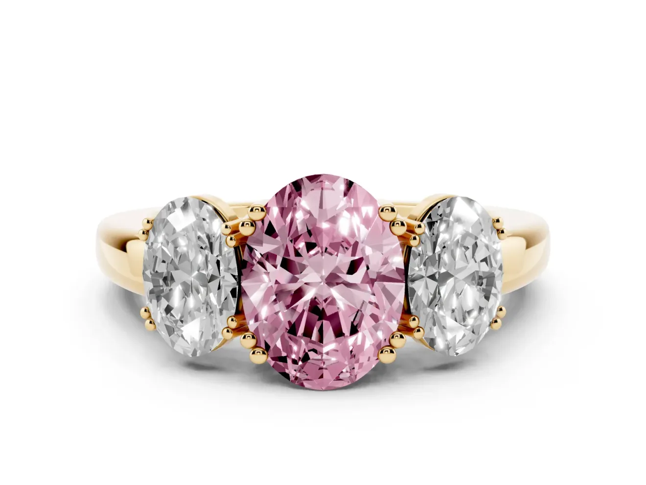 Fancy Pink Oval Cut Diamond Three-Stone Ring Set in Yellow gold with Polished Band and Prong Setting