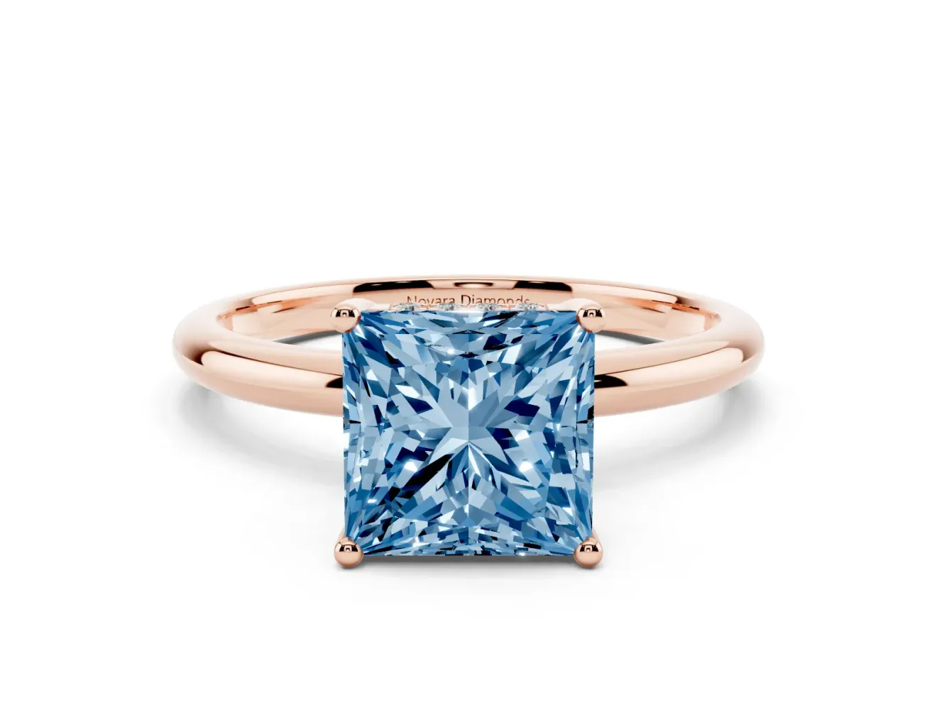 Fancy Blue Princess Cut Diamond Solitaire Engagement Ring Set in Rose gold with Prong Setting and Polished Band