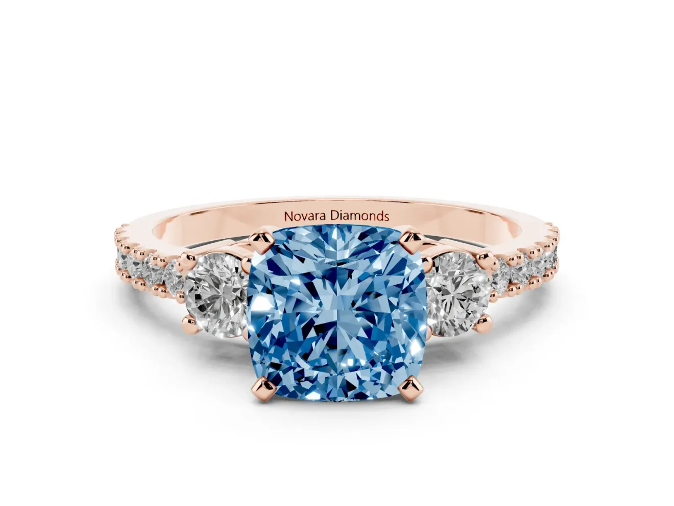 Fancy Blue Three-Stone Cushion Cut Diamond Pavé Band Ring Set in Rose gold with Prong Setting
