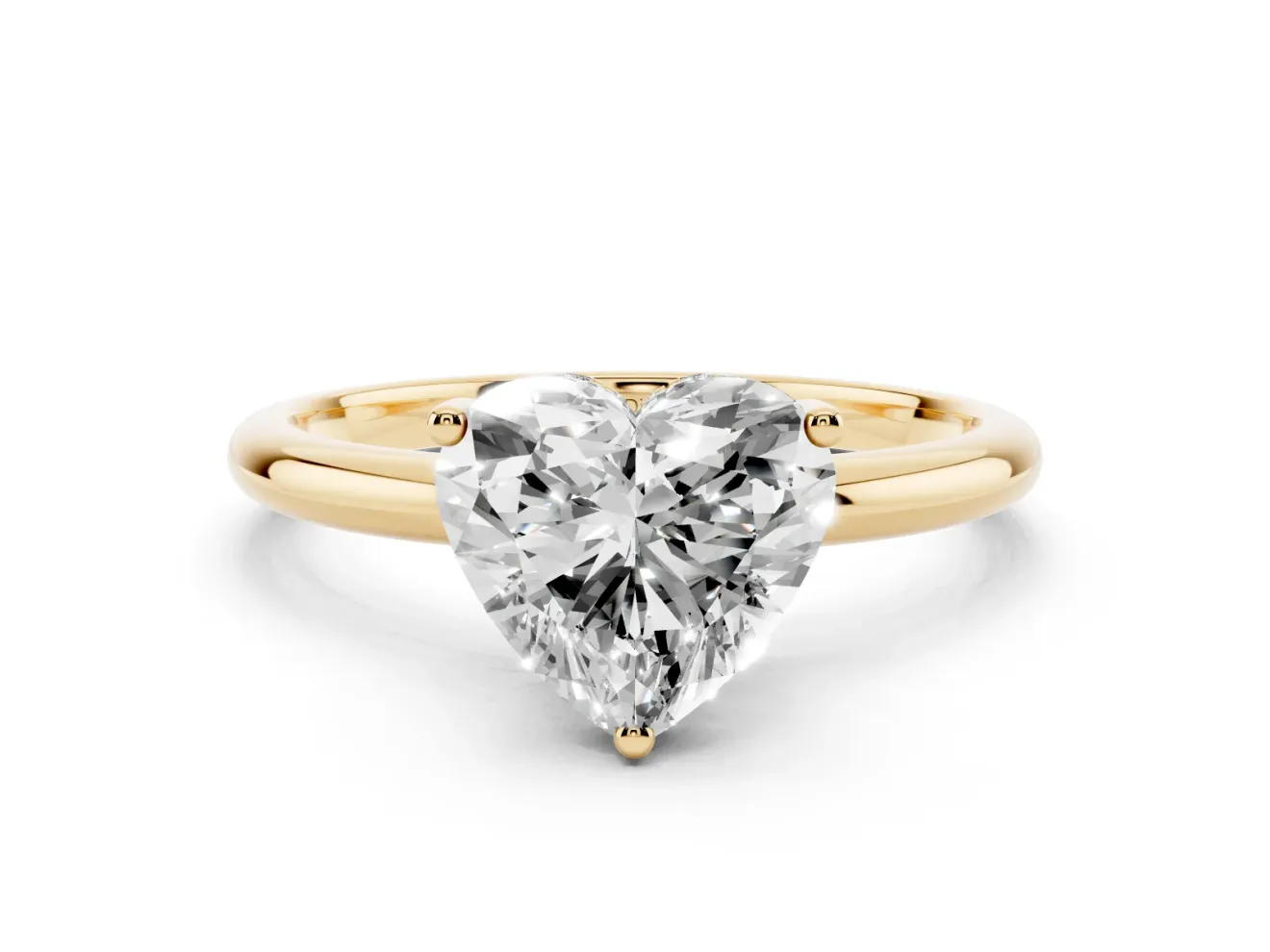 Heart Cut Diamond Solitaire Engagement Ring Set in Yellow gold with Prong Setting and Polished Band