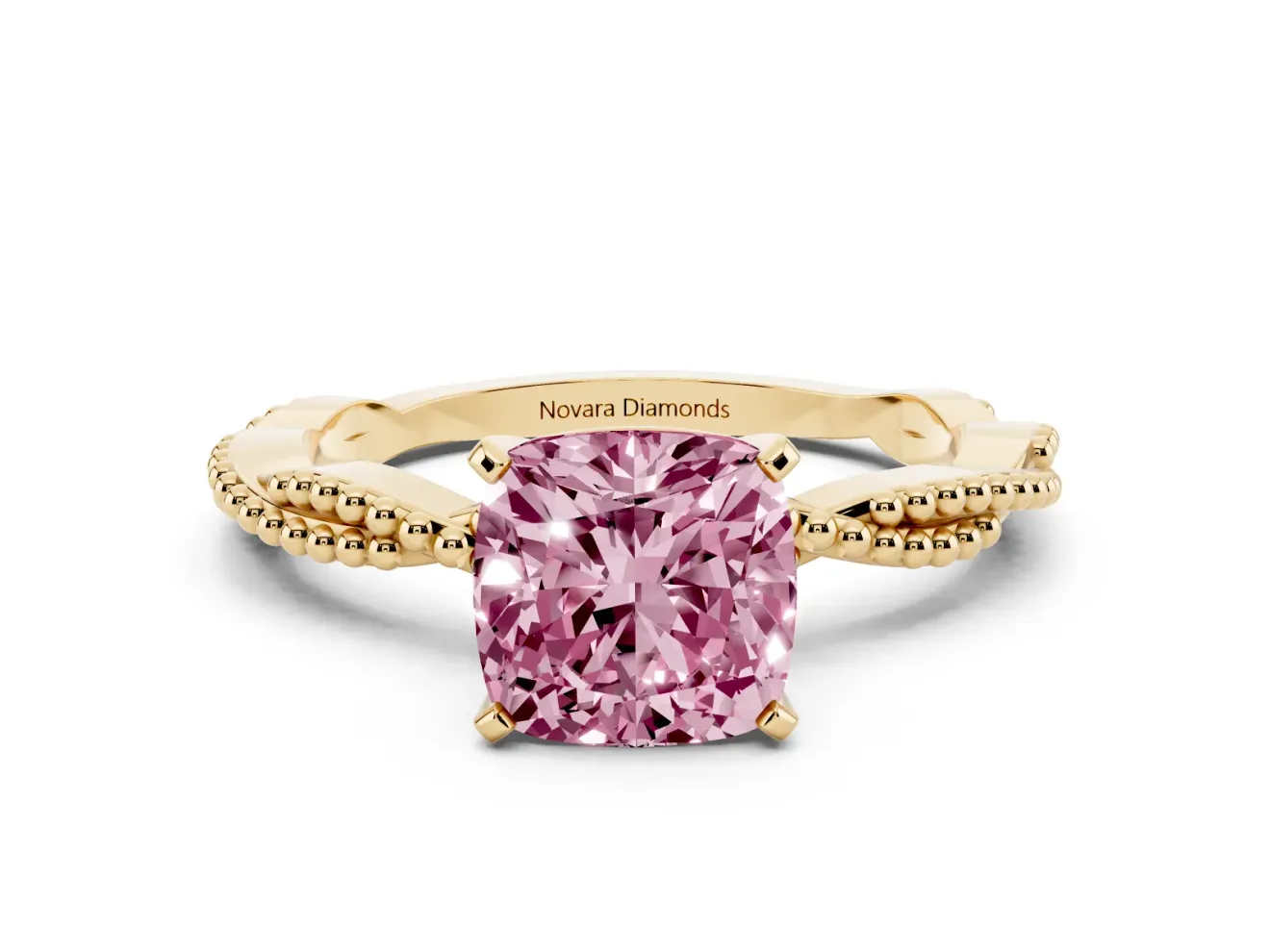 Fancy Pink Cushion Cut Diamond Solitaire Ring Set in Yellow gold with Twisted Band and Bead Prong Setting