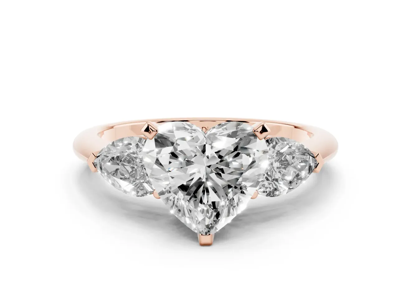 Three-Stone Heart Cut Diamond Ring Set in Rose gold with Pear Side Stones and Prong Setting