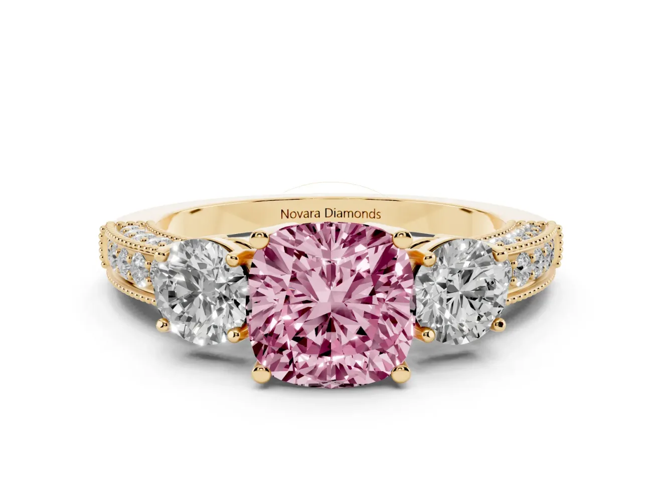 Fancy Pink Cushion Cut Diamond Three-Stone Ring Set in Yellow gold with Round Side Stones and Pavé Band
