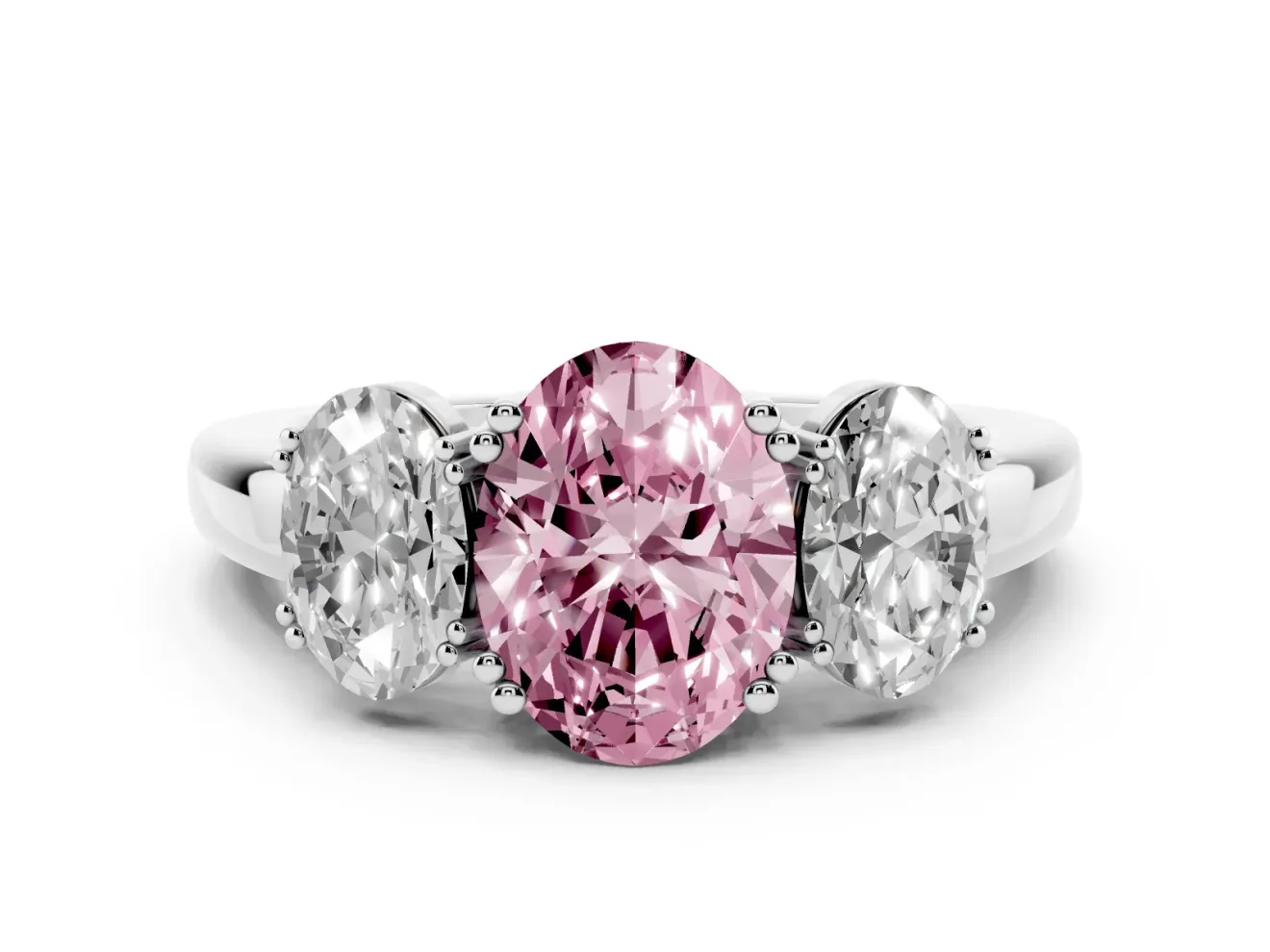 Fancy Pink Oval Cut Diamond Three-Stone Ring Set in Platinum with Polished Band and Prong Setting
