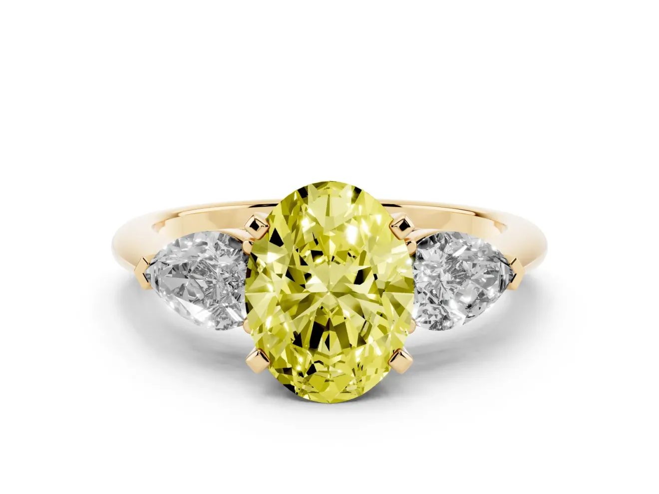 Fancy Yellow Three-Stone Oval Cut Diamond Ring Set in Yellow gold with Pear Side Stones and Prong Setting