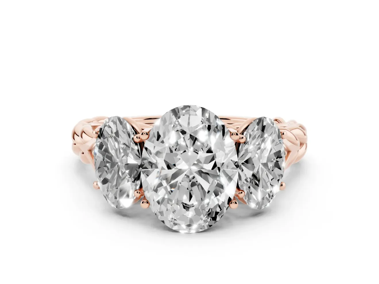 Oval Cut Diamond Three-Stone Ring Set in Rose gold with Braided Band