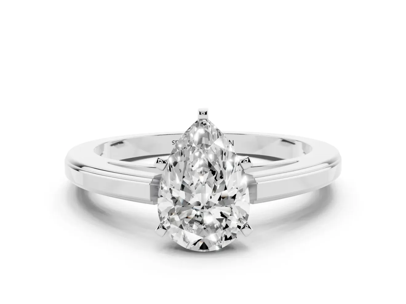 Pear Cut Diamond Solitaire Ring Set in White gold with Prong Setting and Classic Band