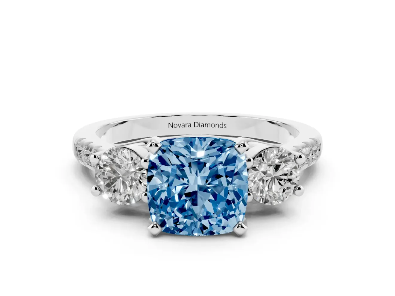 Fancy Blue Three-Stone Cushion Cut Diamond Pavé Band Ring Set in White gold with Prong-Set Trio