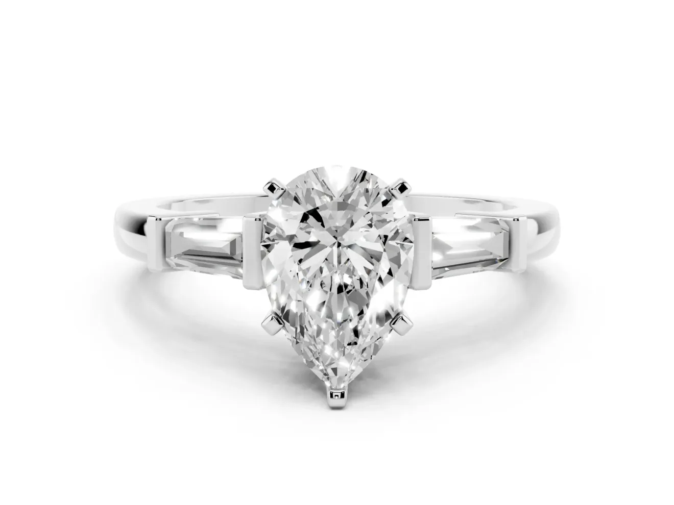 Pear Cut Diamond Solitaire Ring Set in Platinum with Tapered Baguette Accents and Prong Setting