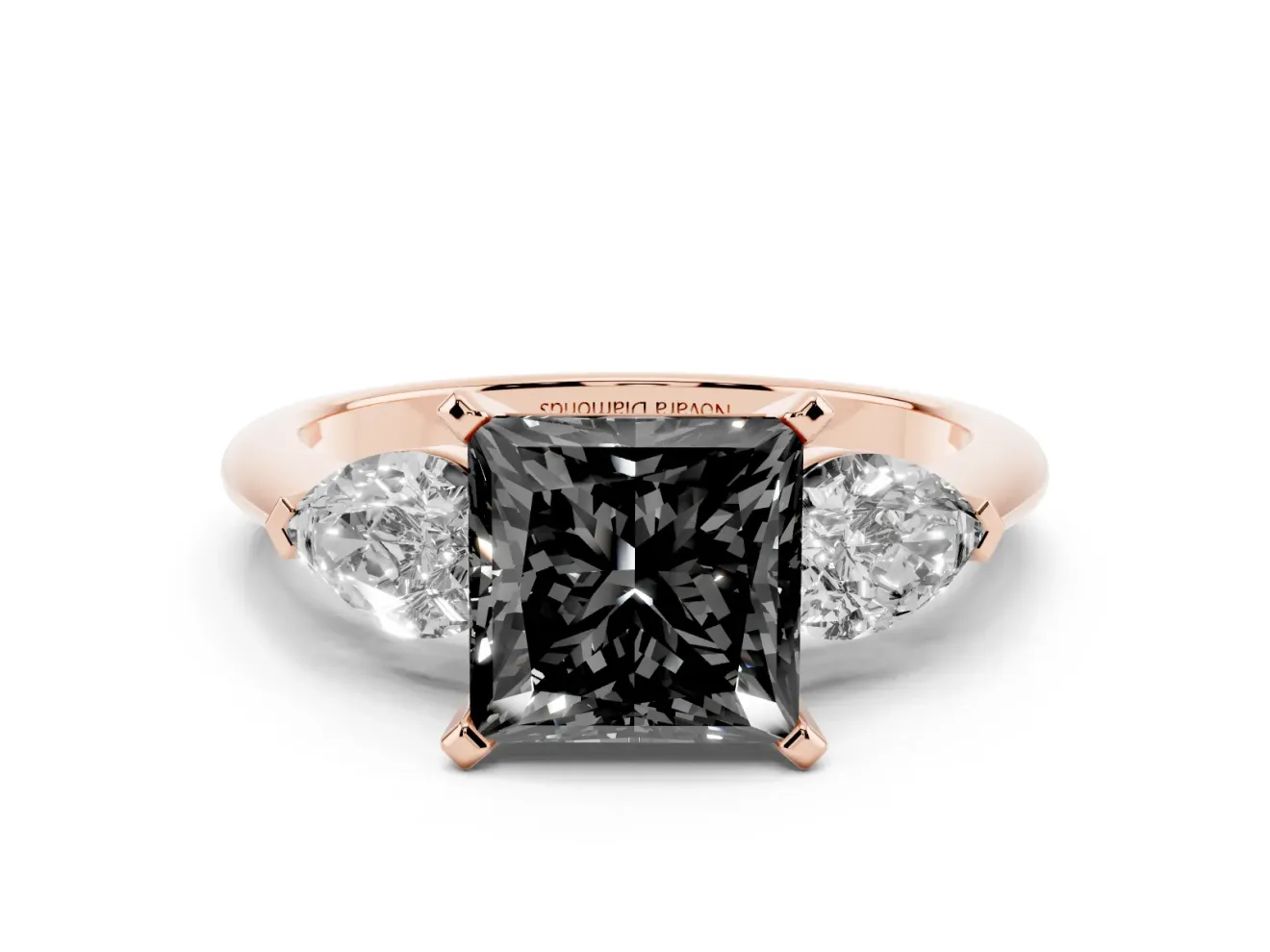 Fancy Black Three-Stone Princess Cut Diamond Ring Set in Rose gold with Pear Side Stones and Prong Setting