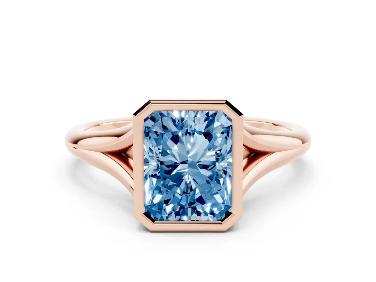 Fancy Blue Bezel Set Radiant Cut Diamond Solitaire Ring Set in Rose gold with Tapered Band