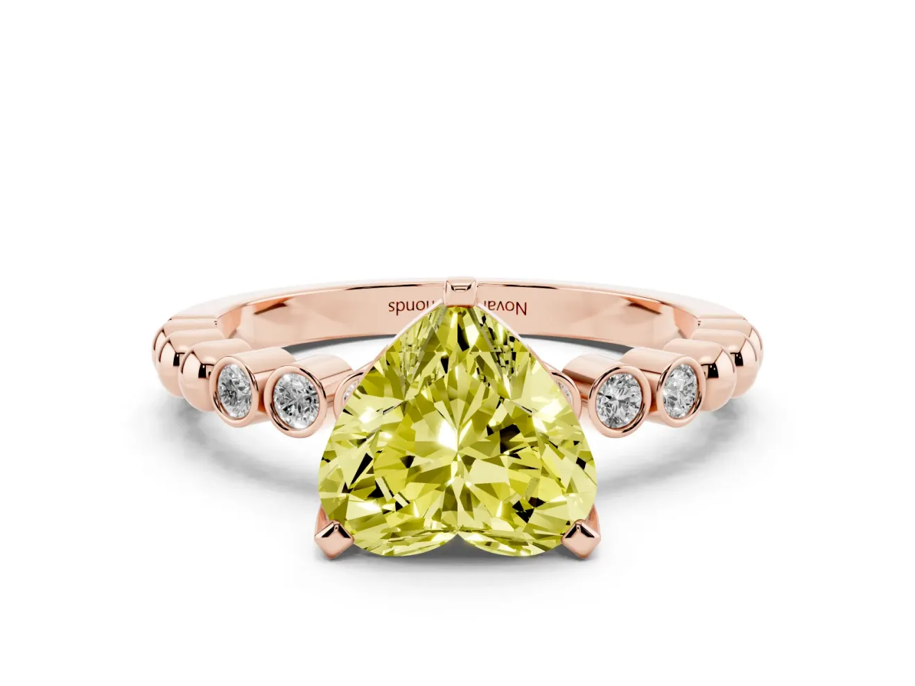 Fancy Yellow Heart Cut Diamond Solitaire Engagement Ring Set in Rose gold with Bezel Accents on Beaded Band
