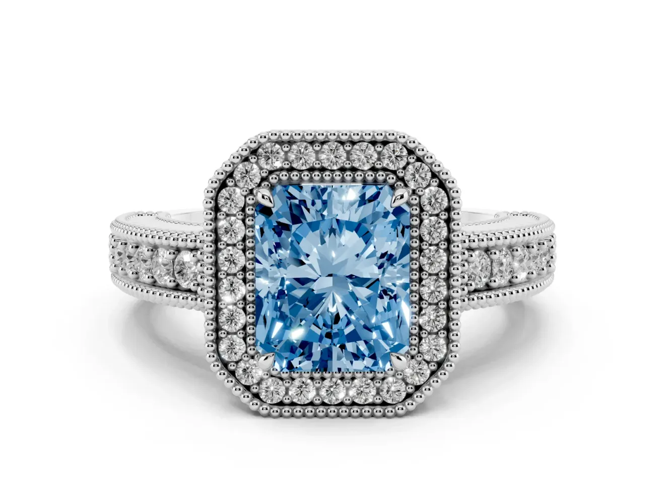 Fancy Blue Radiant Cut Diamond Halo Ring Set in Platinum with Round Accent Halo, Pavé Band and Prong Setting