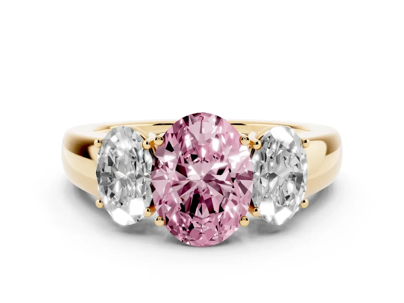 Fancy Pink Three-Stone Oval Cut Diamond Ring Set in Yellow gold with Matching Prong Settings and Plain Band