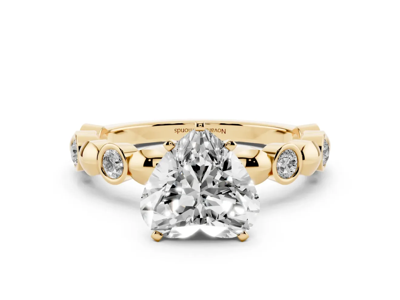 Heart Cut Diamond Solitaire Ring Set in Yellow gold with Bezel-Set Accents on Beaded Band and Prong Setting