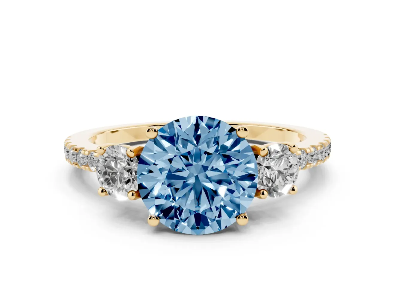 Fancy Blue Round Cut Diamond Three-Stone Ring Set in Yellow gold with Pavé Band and Graduated Sides