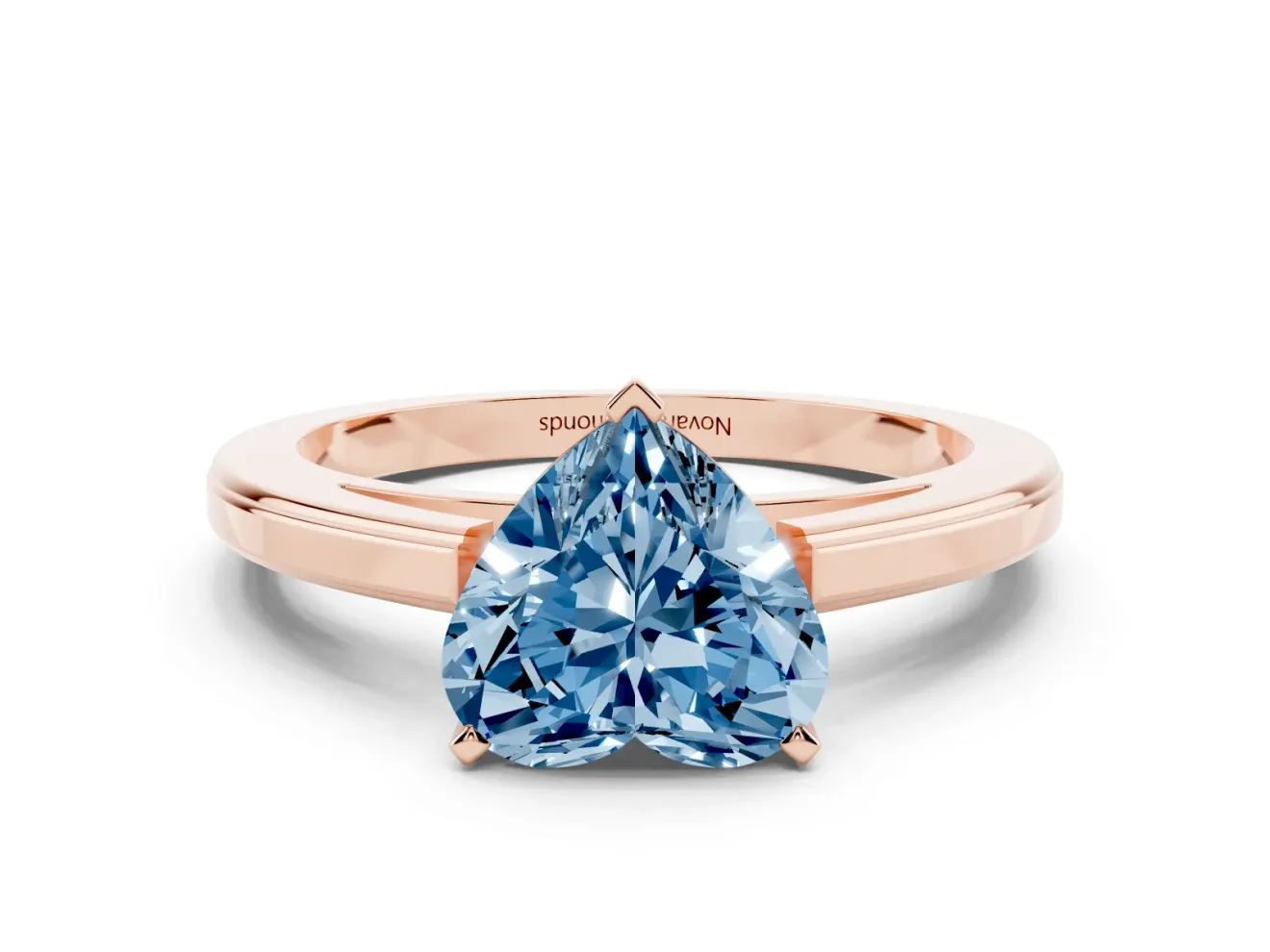 Fancy Blue Heart Cut Diamond Solitaire Ring Set in Rose gold with Prong Setting and Classic Band