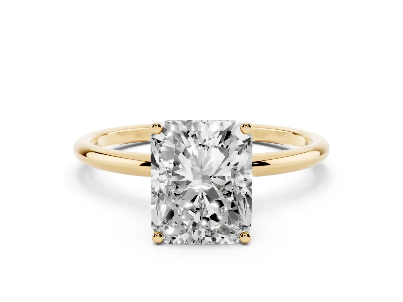 Radiant Cut Diamond Solitaire Engagement Ring Set in Yellow gold with Thin Band and Prong Setting