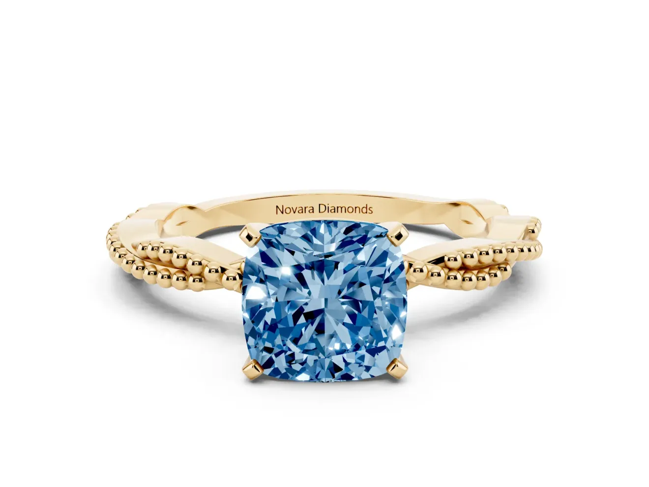 Fancy Blue Cushion Cut Diamond Solitaire Ring Set in Yellow gold with Twisted Band and Bead Prong Setting