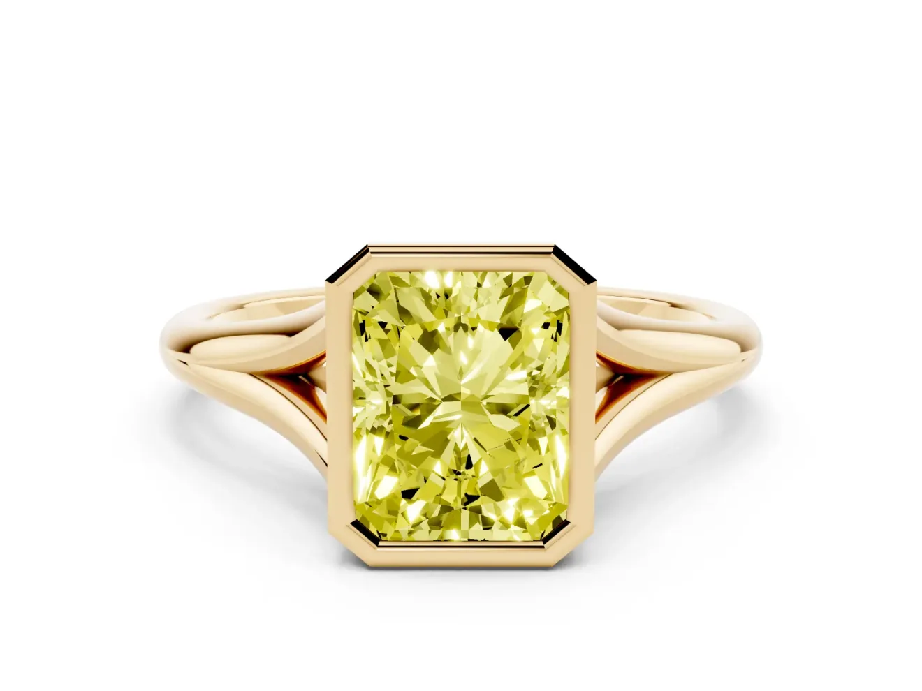 Fancy Yellow Bezel Set Radiant Cut Diamond Solitaire Ring Set in Yellow gold with Tapered Band