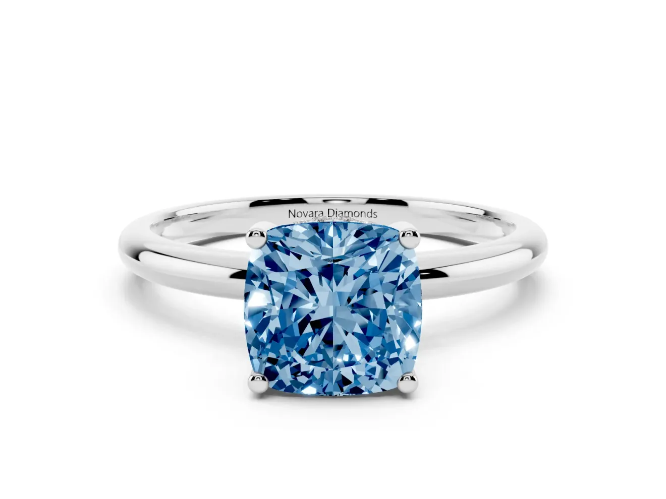Fancy Blue Cushion Cut Diamond Solitaire Engagement Ring Set in White gold with Prong Setting and Polished Band