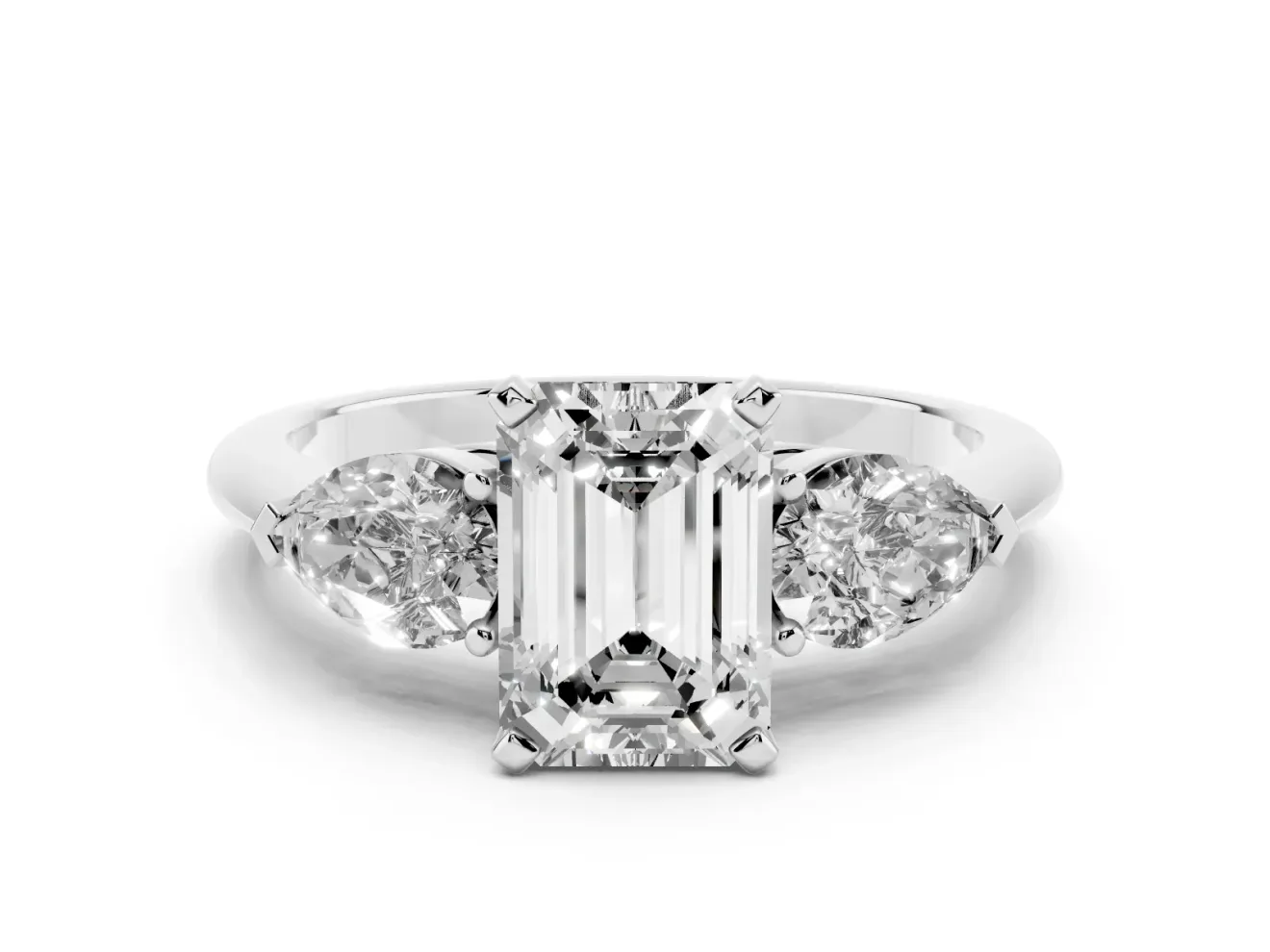 Three-Stone Emerald Cut Diamond Ring Set in Silver with Pear Side Stones and Prong Setting
