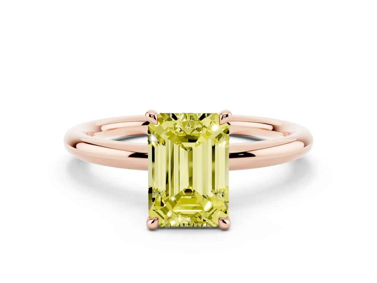 Fancy Yellow Emerald Cut Diamond Solitaire Ring Set in Rose gold with Thin Band and Prong Setting