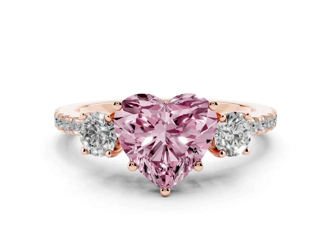 Fancy Pink Heart Cut Diamond Three-Stone Ring Set in Rose gold with Pavé Band and Graduated Sides