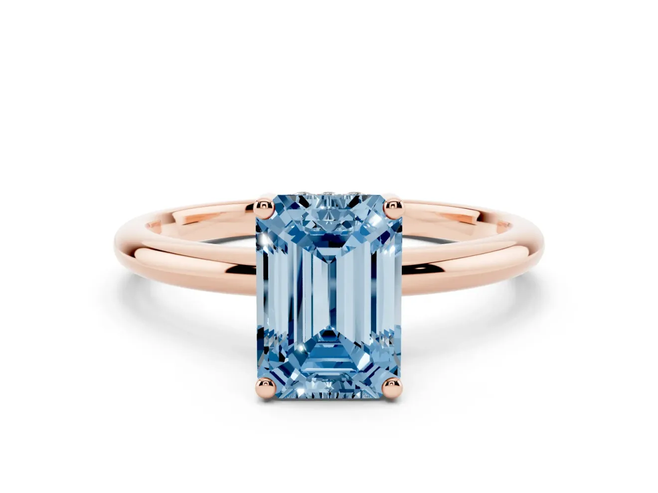 Fancy Blue Emerald Cut Diamond Solitaire Engagement Ring Set in Rose gold with Prong Setting and Polished Band