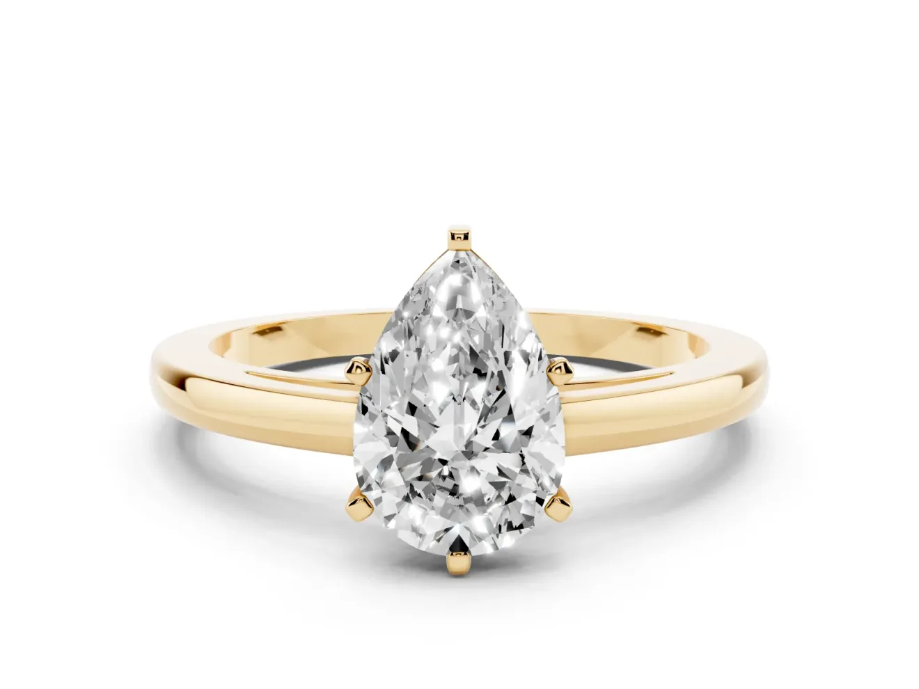 Pear Cut Diamond Solitaire Engagement Ring Set in Yellow gold with Prong Setting on a Classic Band