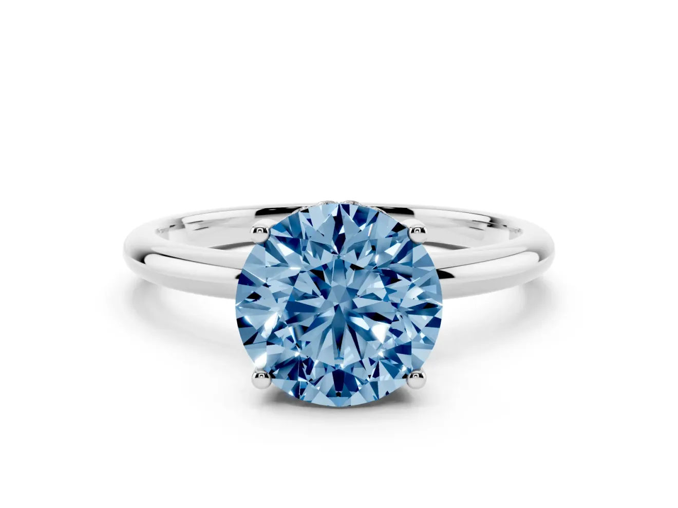 Fancy Blue Round Cut Diamond Solitaire Engagement Ring Set in White gold with Prong Setting and Polished Band