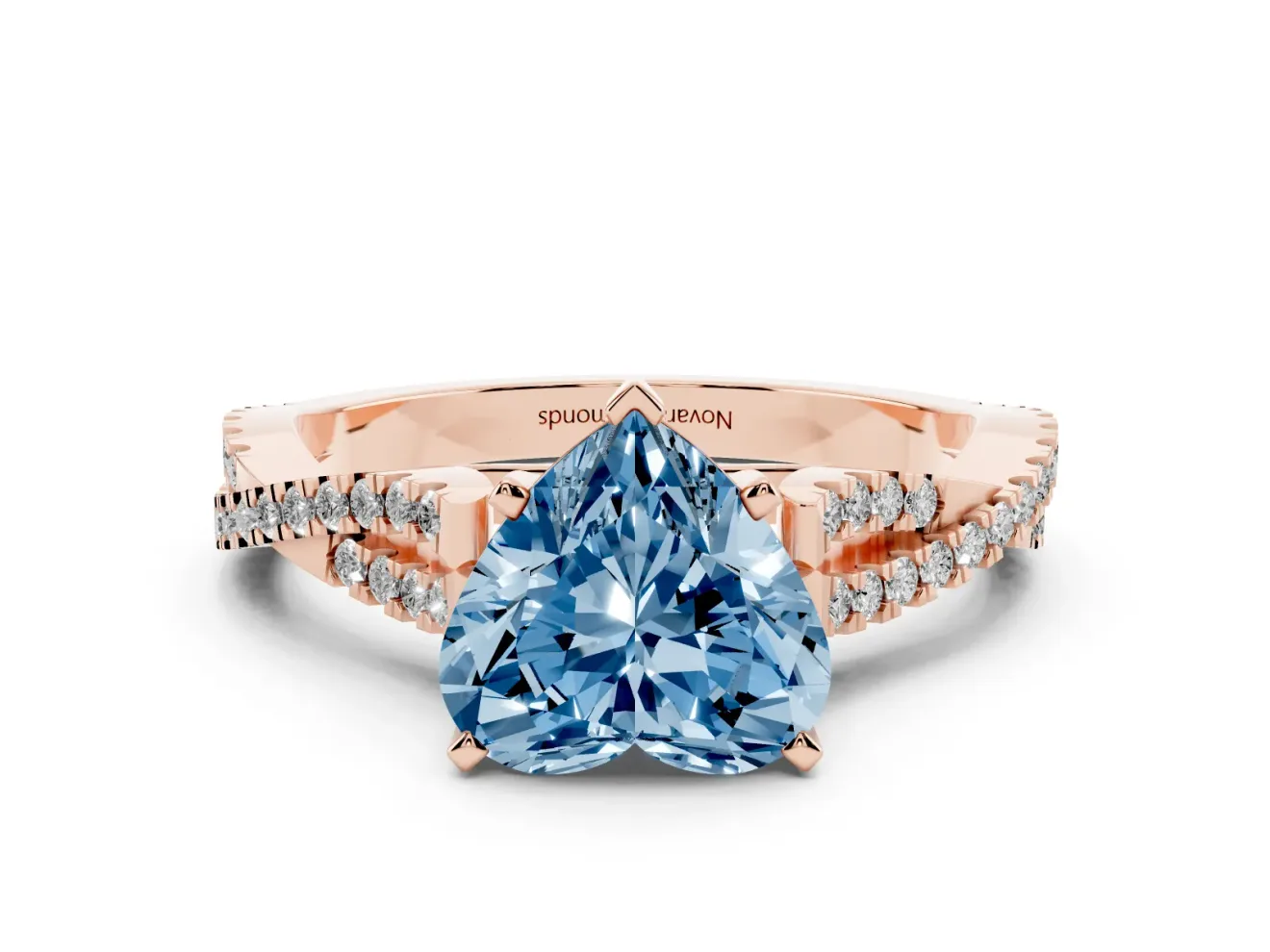 Fancy Blue Heart Cut Diamond Solitaire Engagement Ring Set in Rose gold with Twisted Pavé Band and Prong Setting