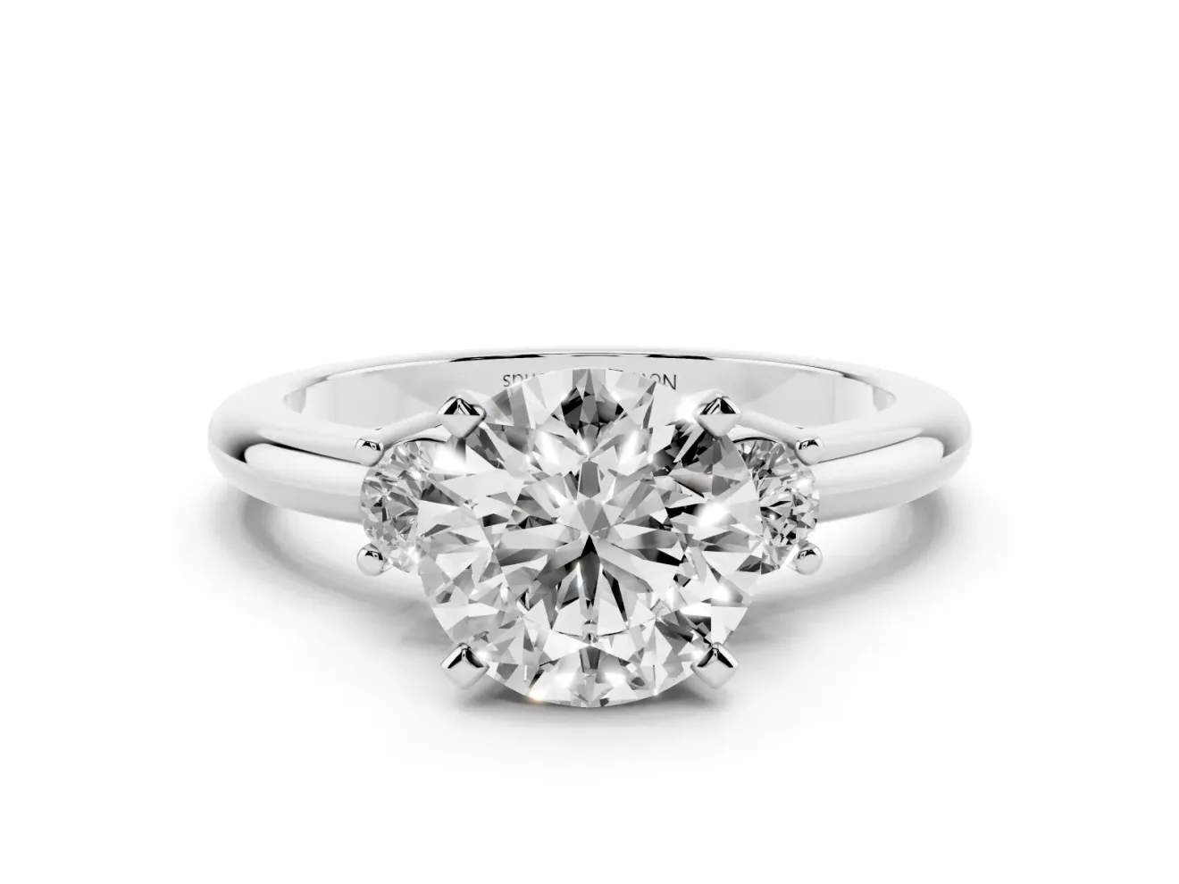Three-Stone Round Cut Diamond Ring Set in White gold with Prong Setting and Plain Band